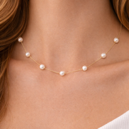 18K Gold Pearl Station Necklace.