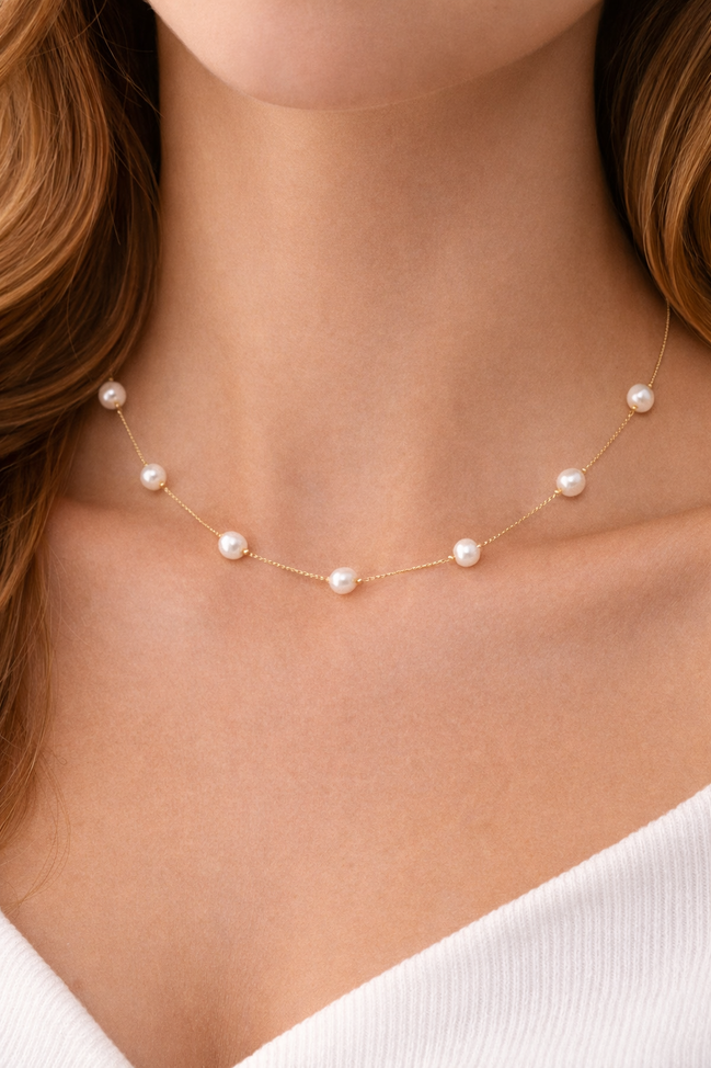 18K Gold Pearl Station Necklace.